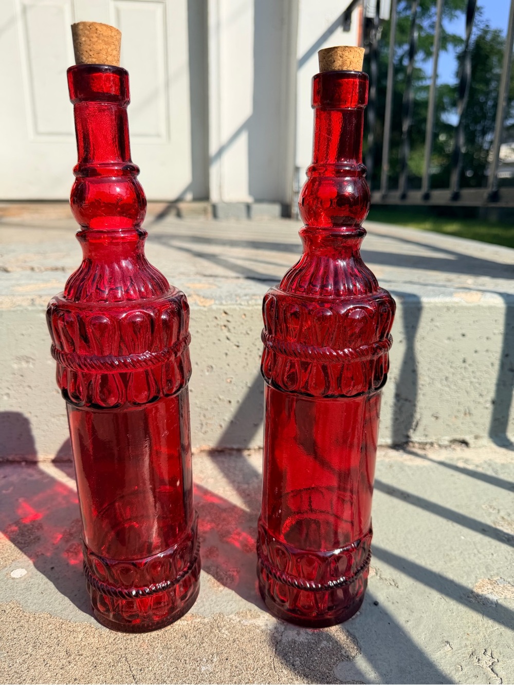 Vintage-Inspired Red Decorative Glass Bottle Pair with Cork Stoppers